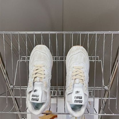 Miu Miu x New Balance 574 Denim sneakers in white