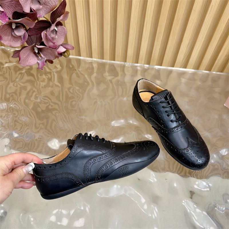 Miu Miu Leather Brogue Shoes.