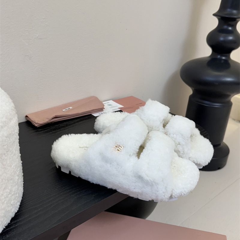 Miu Miu Natural Shearling Slides.