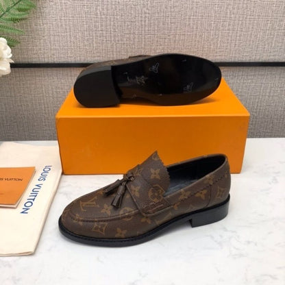 Louis Vuitton Voltaire Loafer in brown monogram canvas