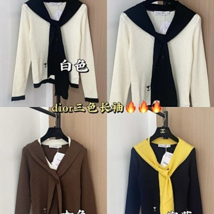 Christian Dior sweater with yellow accents.