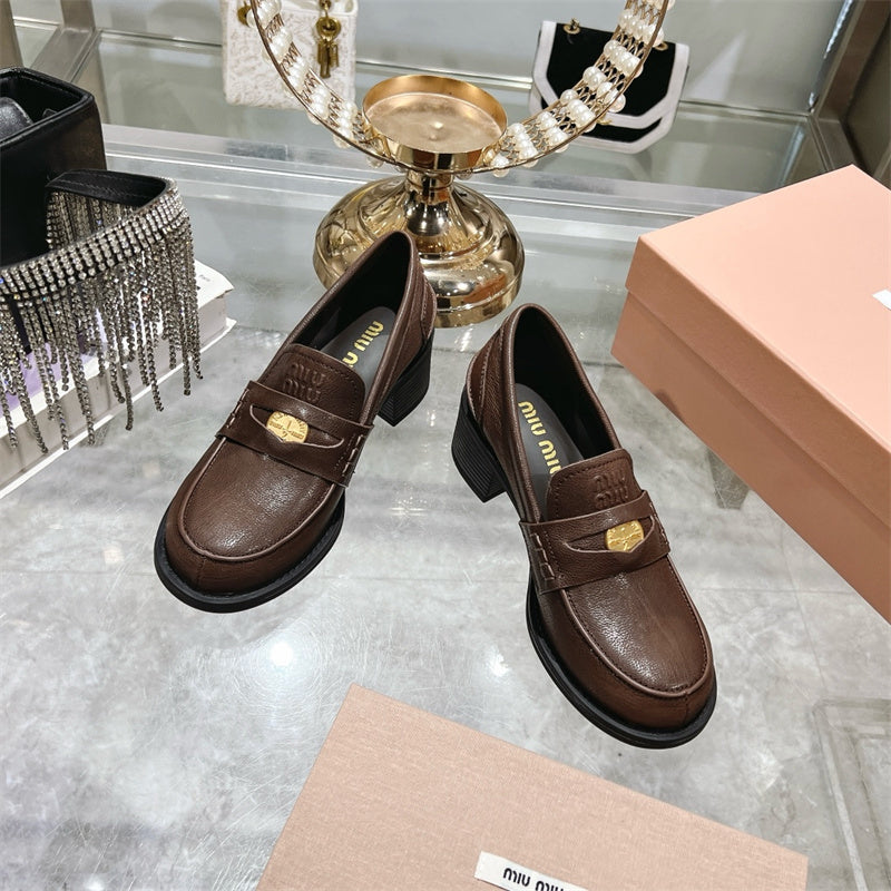 Miu Miu Decò Calf Leather Loafers.