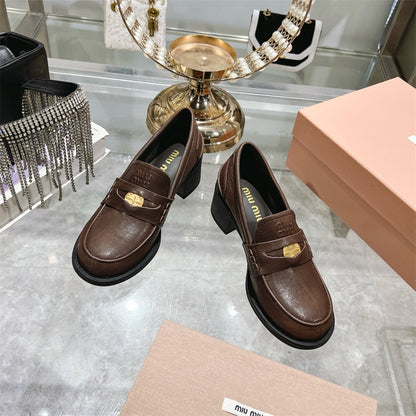 Miu Miu Decò Calf Leather Loafers.