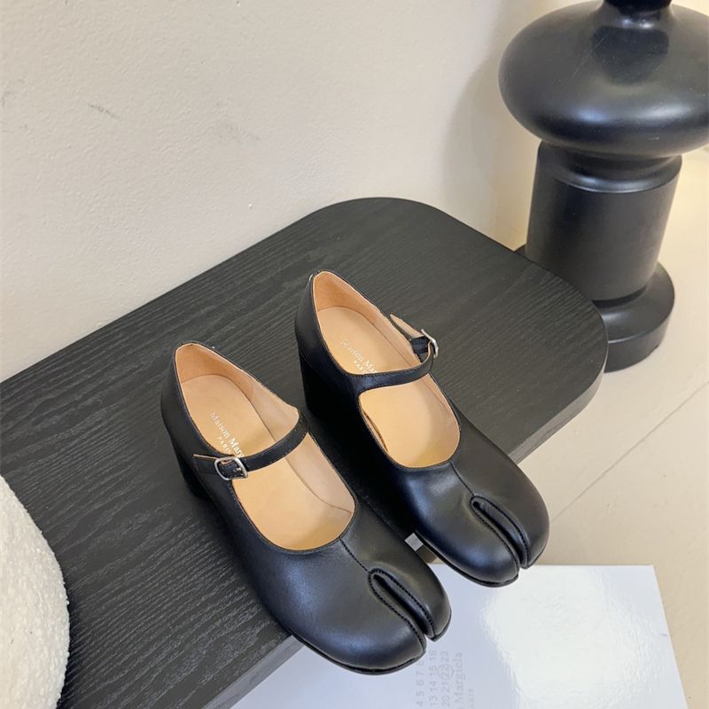 Miu Miu Tabi Mary Jane pumps.