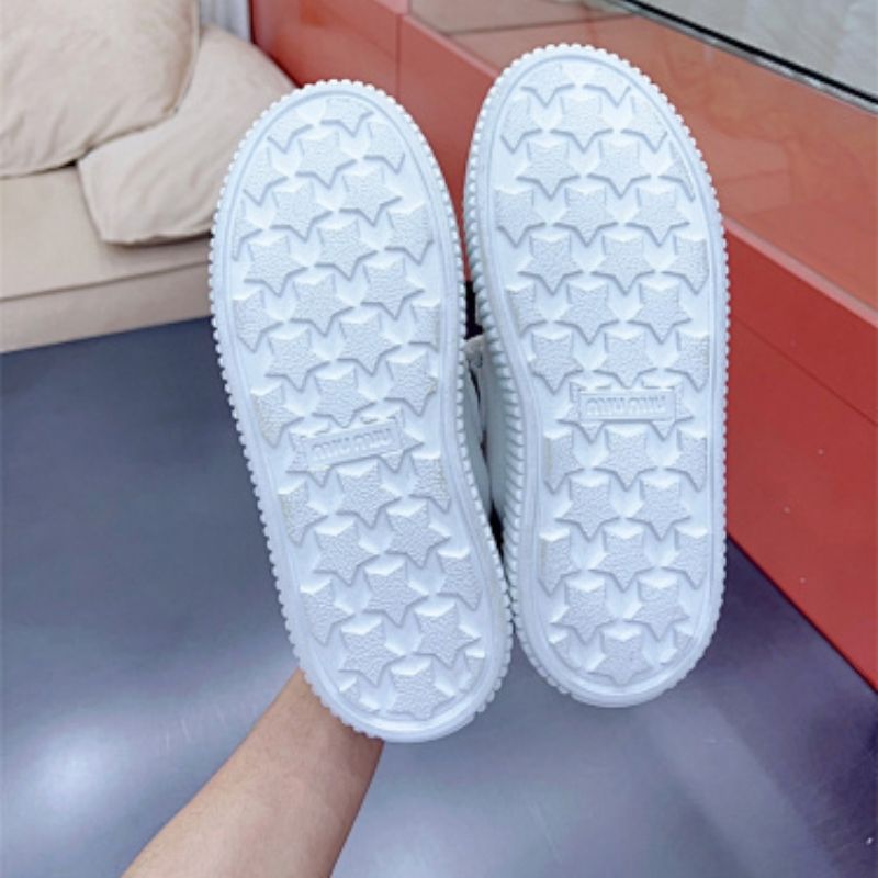 Miu Miu "Denim" sneakers with a thick, ribbed platform sole