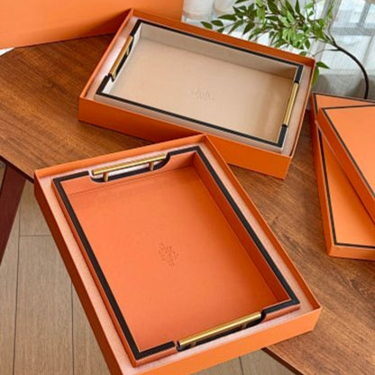 Hermès leather-wrapped serving trays