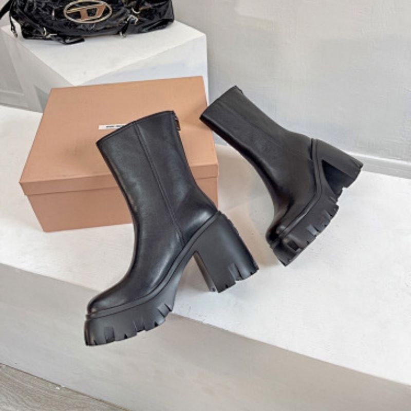 Prada Lug-Sole Leather Chelsea Boots,