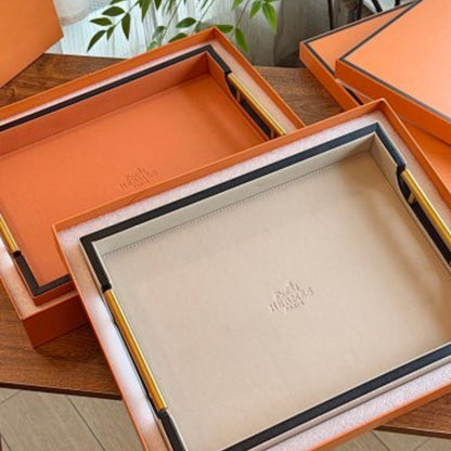 Hermès leather-wrapped serving trays