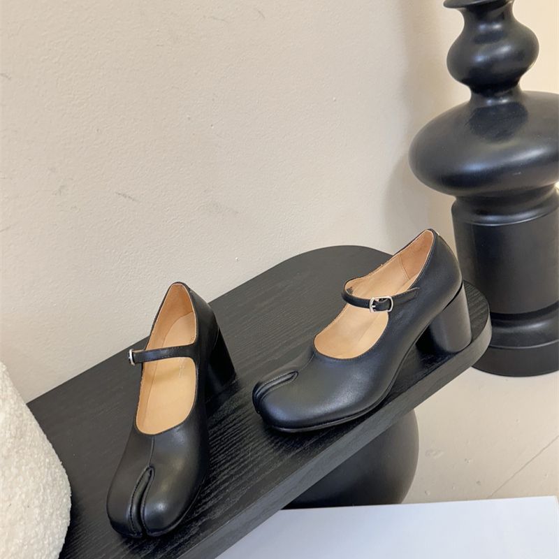 Miu Miu Tabi Mary Jane pumps.