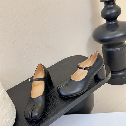 Miu Miu Tabi Mary Jane pumps.