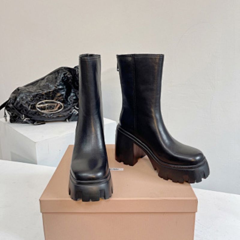 Prada Lug-Sole Leather Chelsea Boots,
