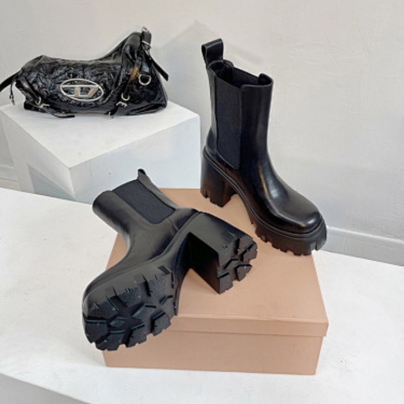 Prada Lug-Sole Leather Chelsea Boots,