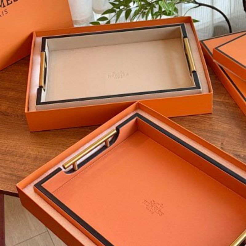Hermès leather-wrapped serving trays