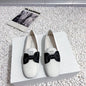 Miu Miu Bow Loafers.