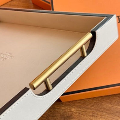Hermès leather-wrapped serving trays