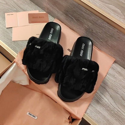 Miu Miu Matelassé Shearling Slide Sandals in black