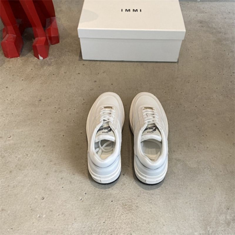 Miu Miu Classic low-top sneaker silhouette with a simple lace-up