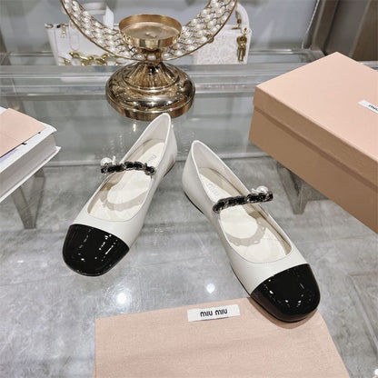 Miu Miu two-tone Mary Jane pumps.