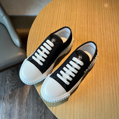 Louis Vuitton black and white version Squad sneakers.