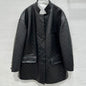 Gucci GG Embossed Leather Jacket in black.
