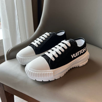Louis Vuitton black and white version Squad sneakers.