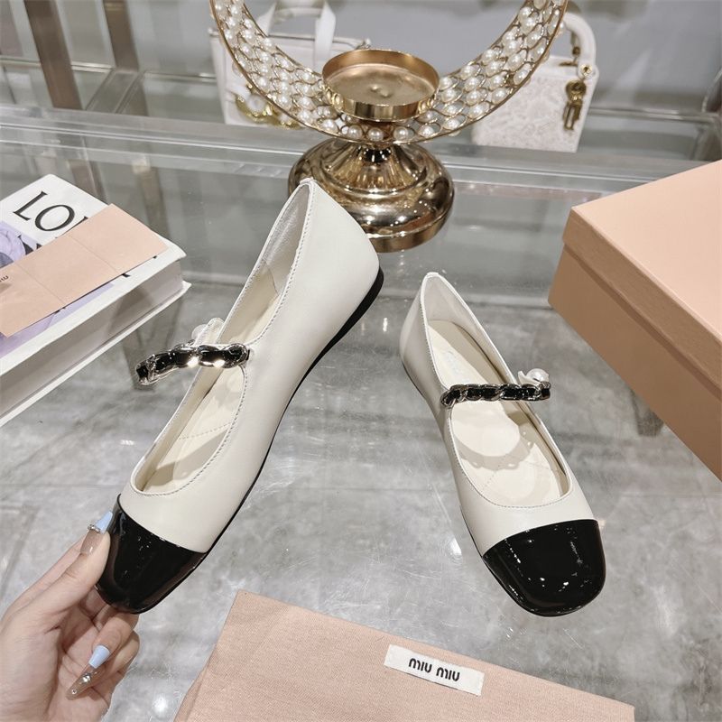 Miu Miu two-tone Mary Jane pumps.