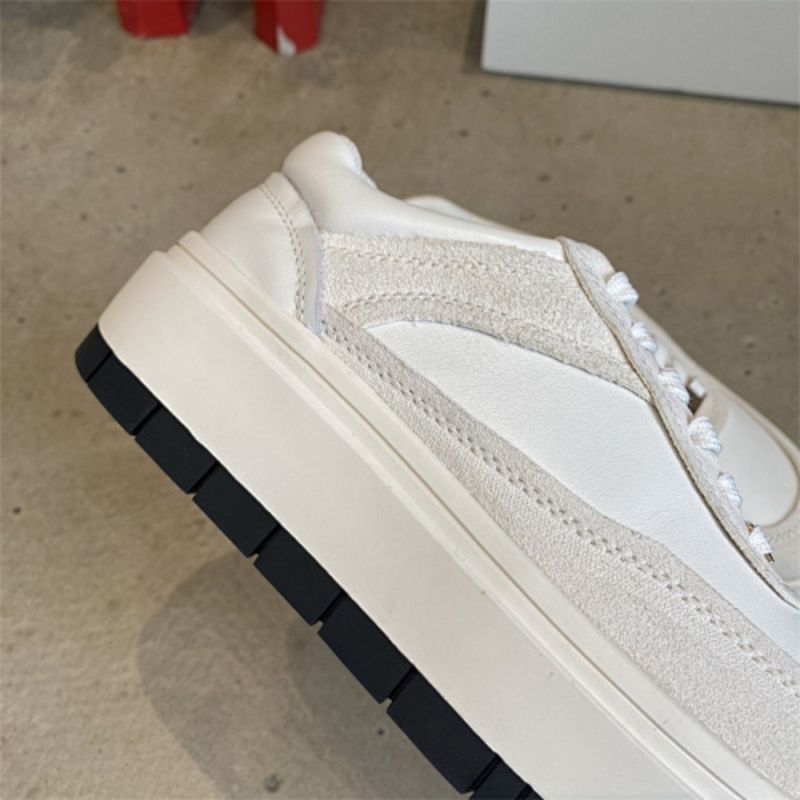 Miu Miu Classic low-top sneaker silhouette with a simple lace-up