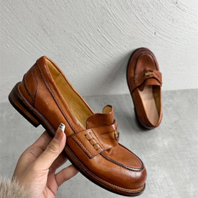 Miu miu brown leather loafers with gold-tone hardware detail,