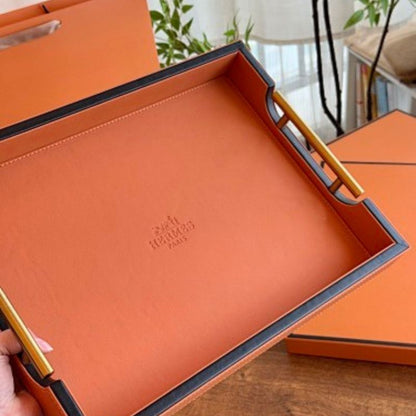 Hermès leather-wrapped serving trays