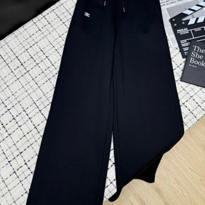 black bomber jacket and matching sweatpants set