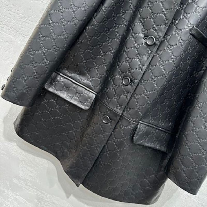 Gucci GG Embossed Leather Jacket in black.