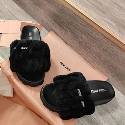 Miu Miu Matelassé Shearling Slide Sandals in black