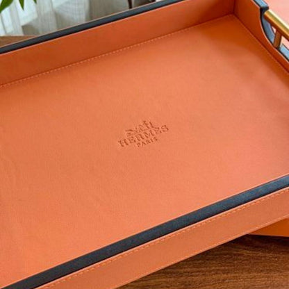 Hermès leather-wrapped serving trays