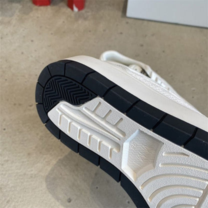 Miu Miu Classic low-top sneaker silhouette with a simple lace-up