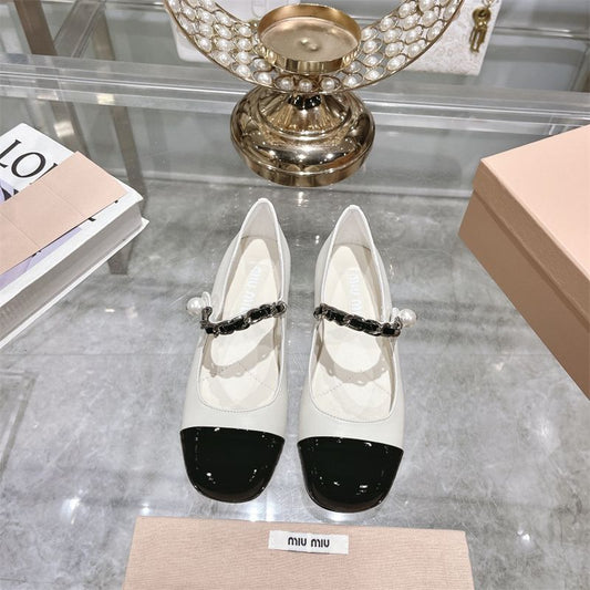 Miu Miu two-tone Mary Jane pumps.