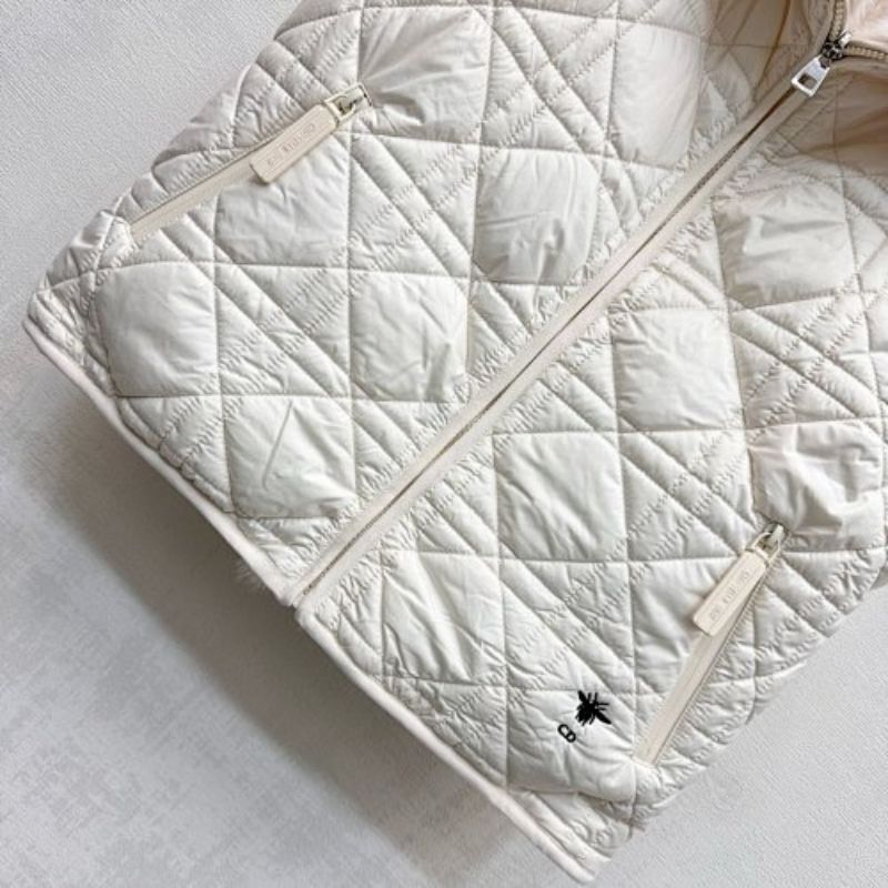 Christian Dior white faux fur zip-up vest with a high, quilted collar