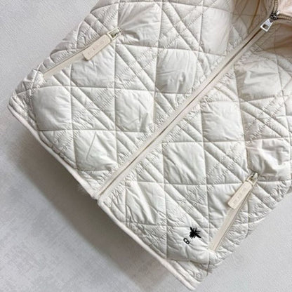 Christian Dior white faux fur zip-up vest with a high, quilted collar