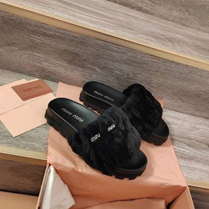 Miu Miu Matelassé Shearling Slide Sandals in black