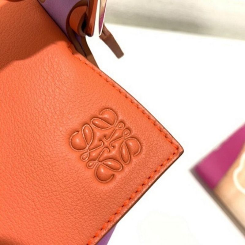 Loewe Puzzle Mini Bag in a multi-toned orange and purple