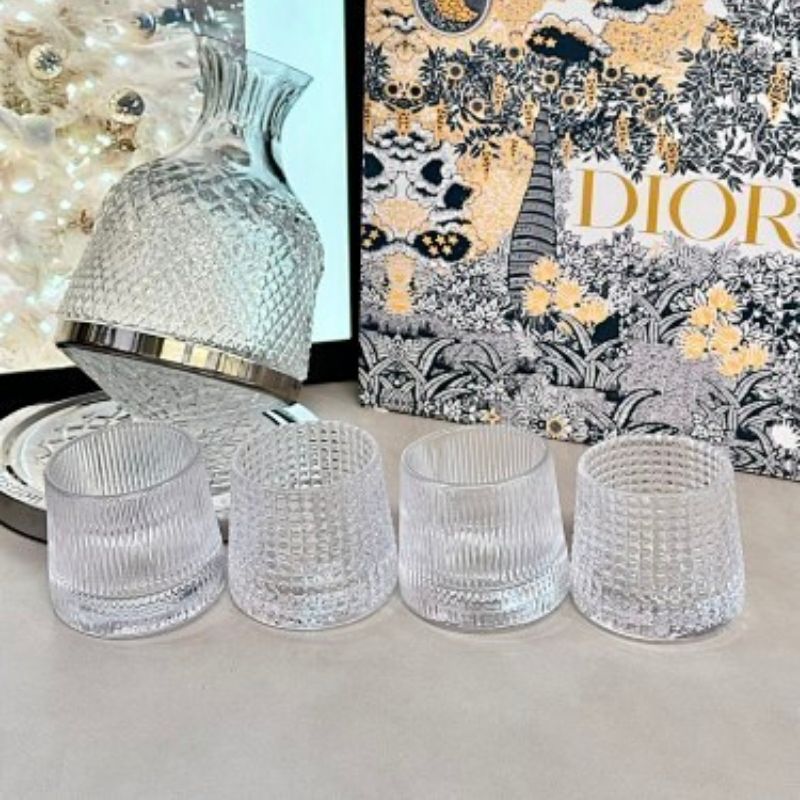 Dior rotating whiskey glass set,