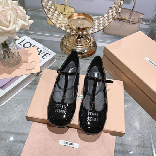Miu Miu Logo-Lettering Patent Ballerina Flats in black.