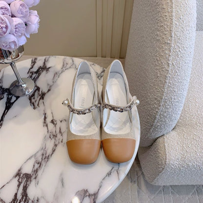 Miu Miu Mary Jane flats.