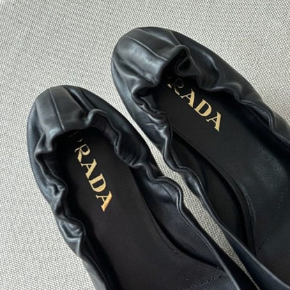 Prada Ruched Logo Elasticized Leather Kitten-Heel Pumps.