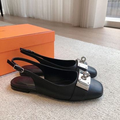 Hermès Innocente Slingback Flats in noir (black) leather,