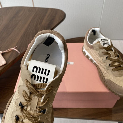 Miu Miu Plume Suede Sneakers.