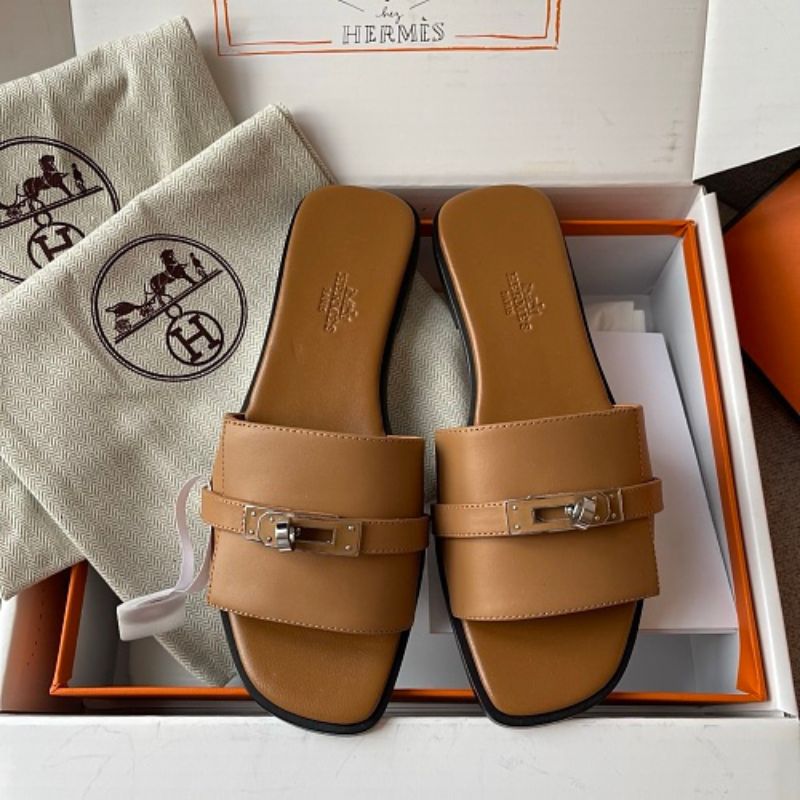 Hermès Giulia Kelly buckle Sandals.