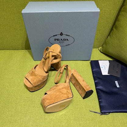 Prada Suede Platform Sandals in a warm camel/tan colorway.