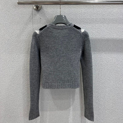 Prada Argyle knit cashmere cardigan in a gray color scheme.