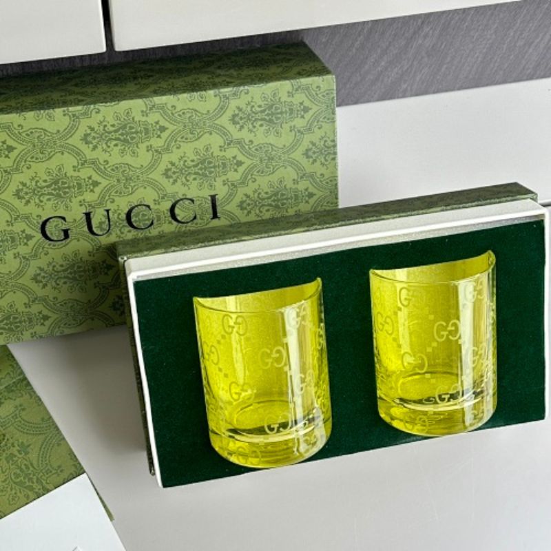 Gucci yellow-tinted crystal tumblers,