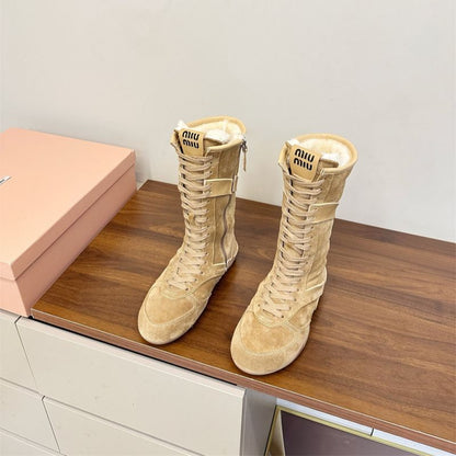 Miu Miu Gymnasium Suede and Shearling Boxer Boots.